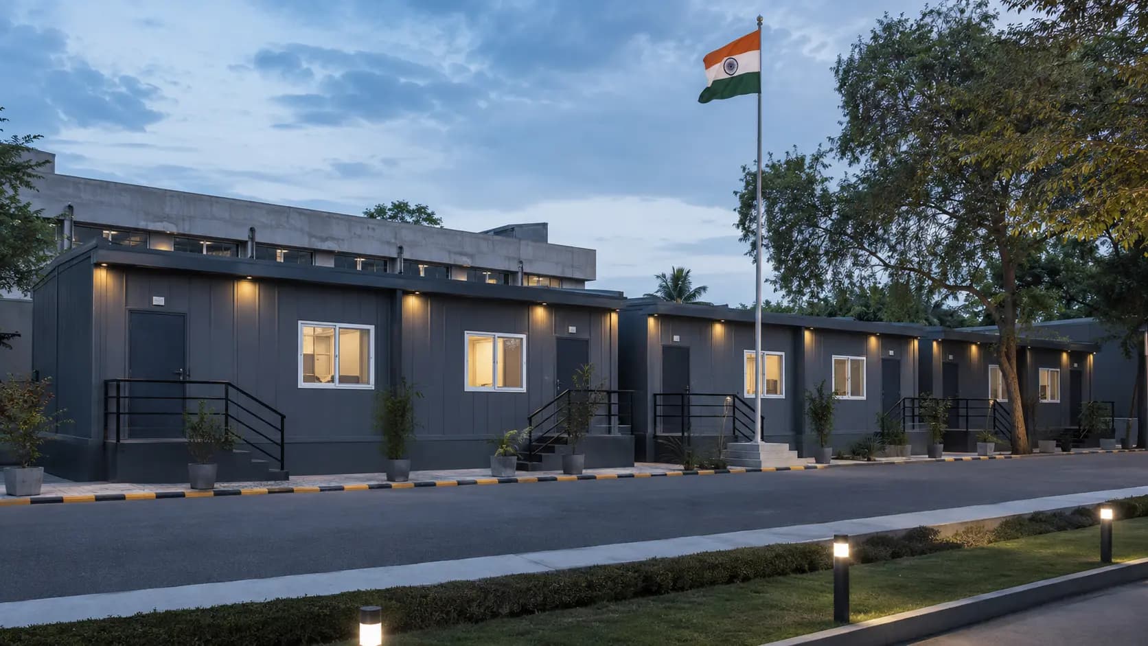 Row of site establishment cabins with the national flag at a government project – available in Bangalore, Chennai, Hyderabad, Mumbai, Pune, Delhi NCR & pan-India