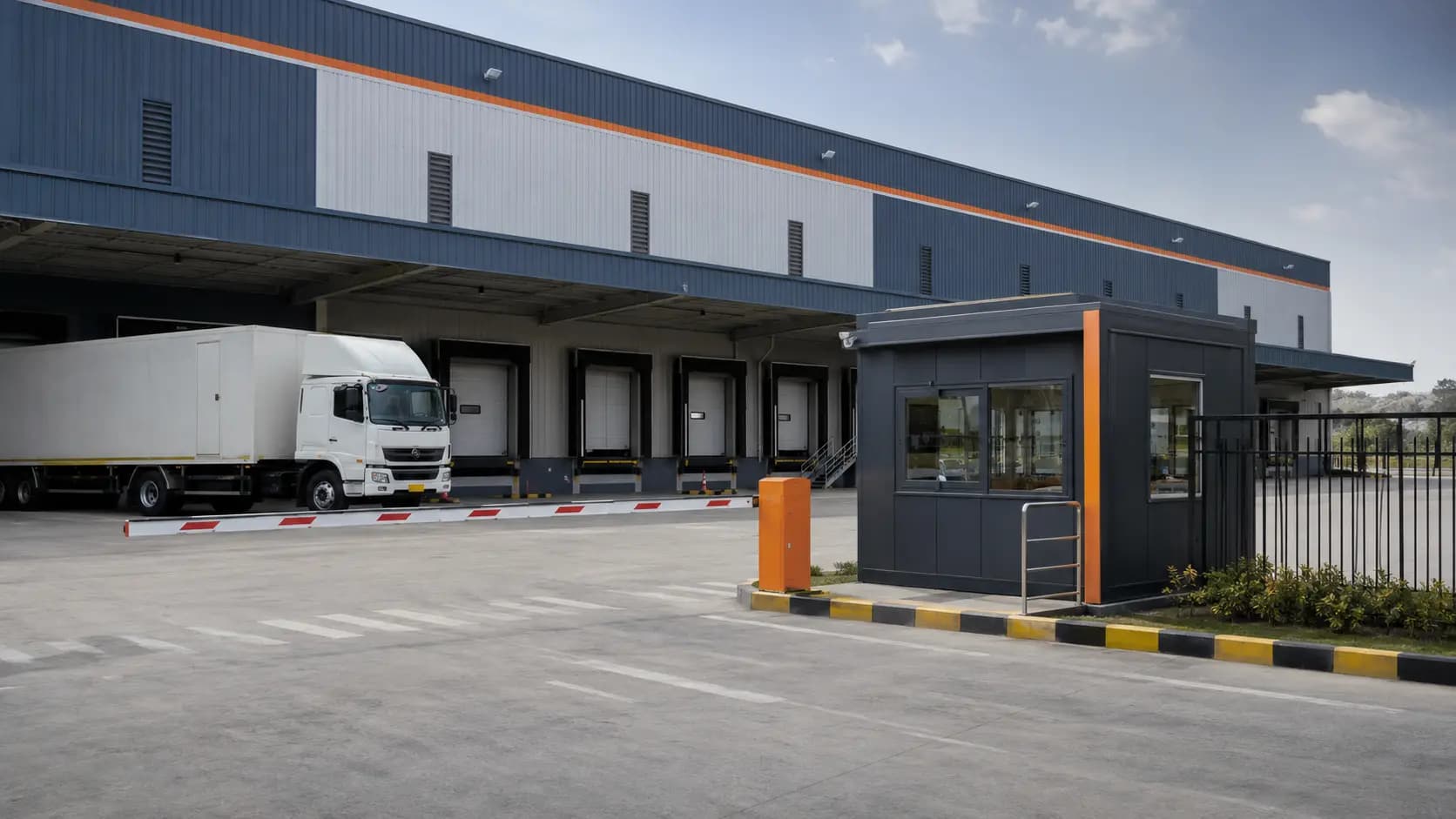 Gate security and dispatch cabin at a warehouse with truck loading docks – available in Bangalore, Chennai, Hyderabad, Mumbai, Pune, Delhi NCR & pan-India