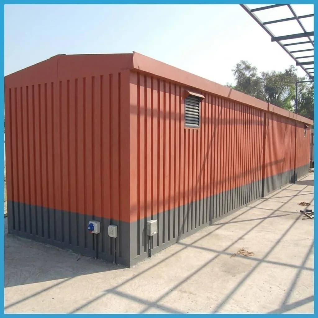 End elevation of a Bommasandra container office with louvre ventilation and external electrical points